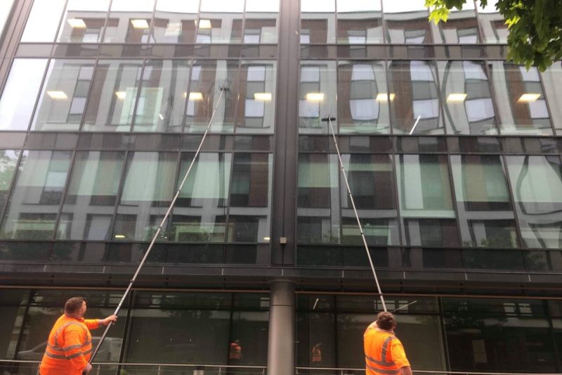 commercial waterfed window cleaning pole in action